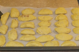 Hours later and I have 34 perogies! You can tell the ones Chris did :P