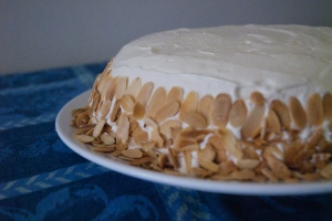Healthy Carrot Cake with Delicious Cream Cheese frosting and toasted almonds